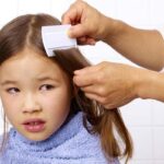 Close-up of straight hair, illustrating a common hair type where head lice can be identified.