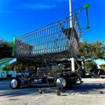 Giant Publix shopping cart with Publix logo and text "Shopping is a pleasure" to illustrate Publix store and shopping experience