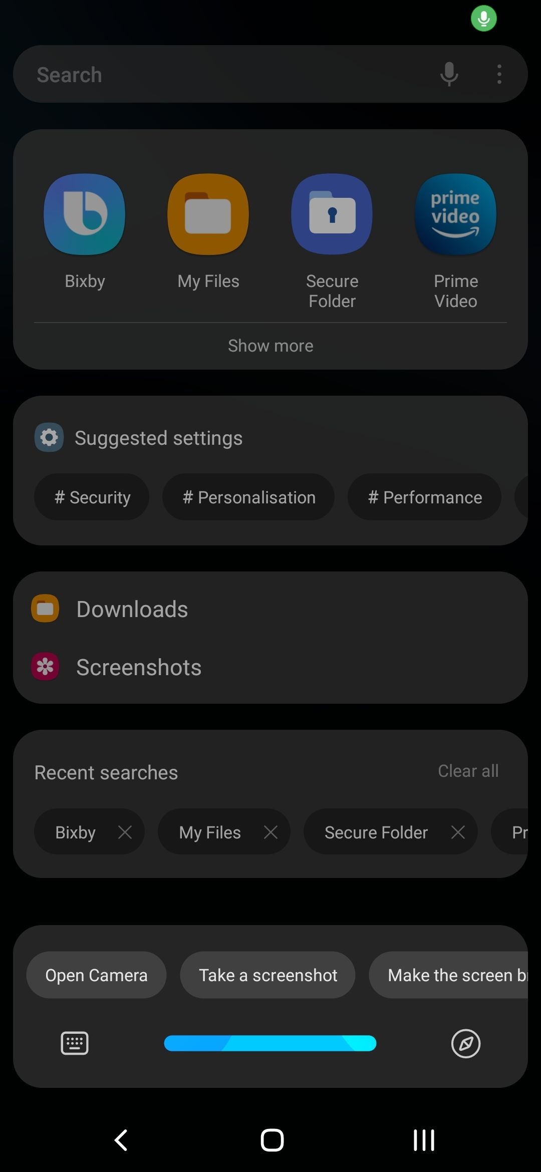 Bixby UI displayed on a Samsung smartphone screen, showing a dark interface with rounded icons and text-based suggestions for voice commands.