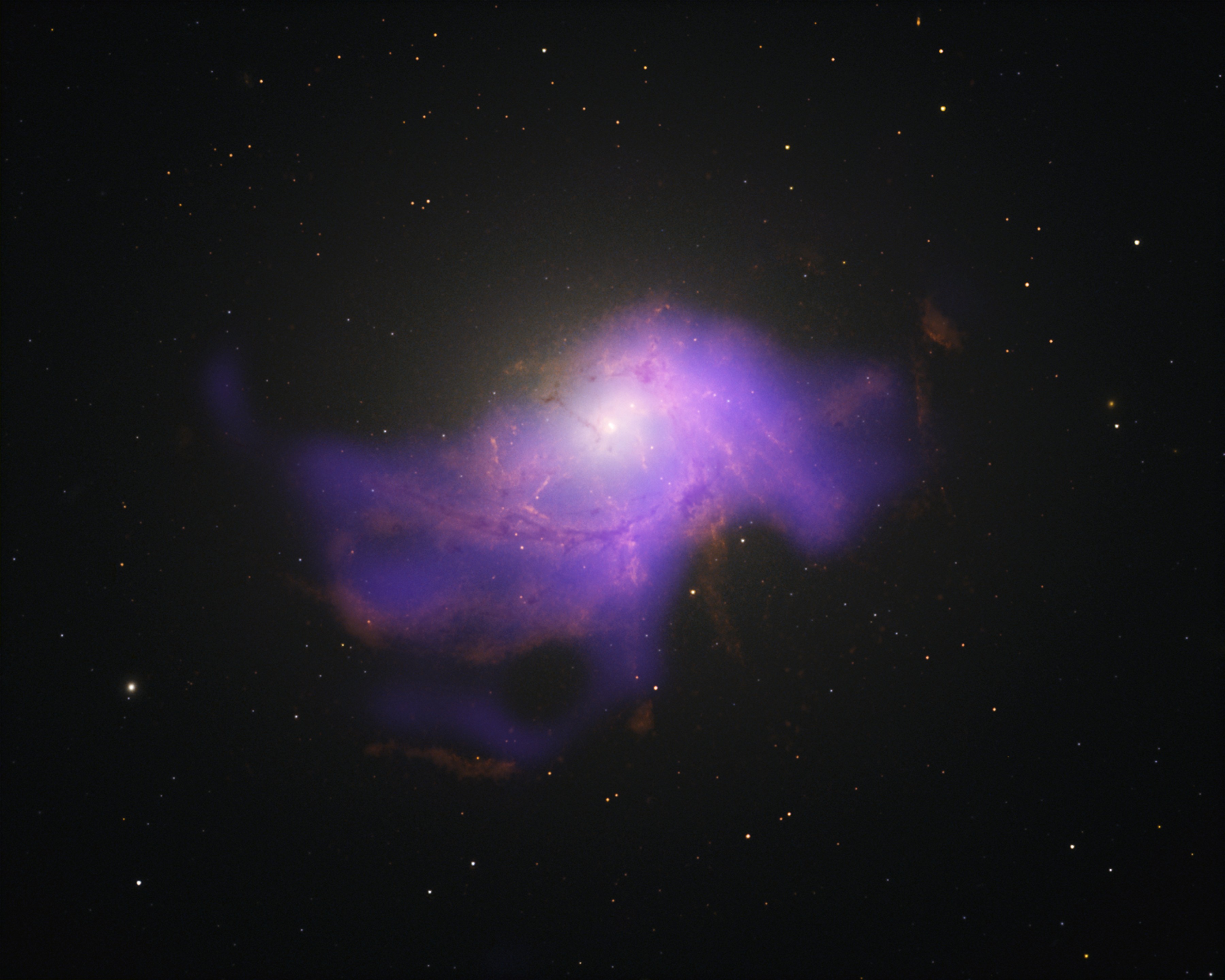 Filaments of hot gas and particles around a black hole, as observed by Chandra X-ray Observatory, illustrating how black holes can influence their surroundings.