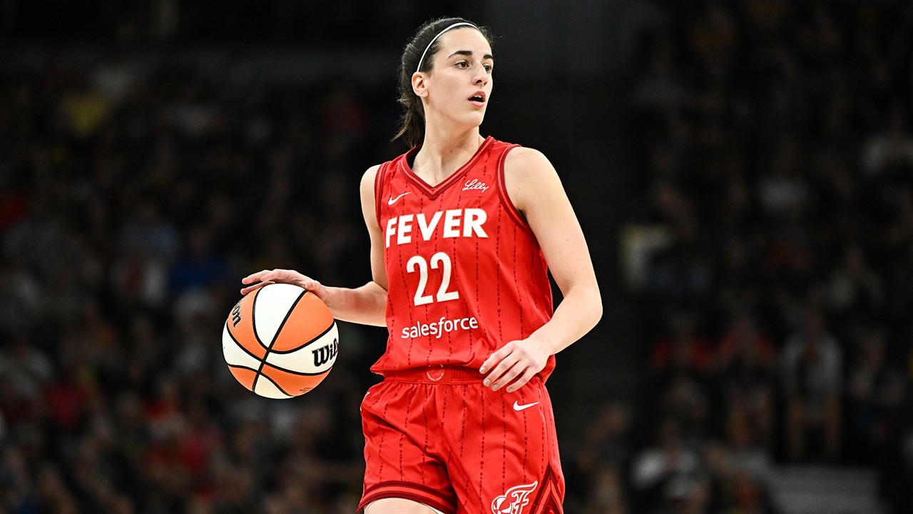 Caitlin Clark of the Indiana Fever in action. Clark was named to the 2024 All-WNBA First Team and Rookie of the Year, showcasing her exceptional talent for the Indiana Fever in the WNBA.