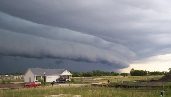 The gust front "arcus" cloud on the leading edge of a derecho-producing storm system. The photo was taken on the evening of July 10, 2008 in Hampshire, Illinois. Credit: Brittney Misialek