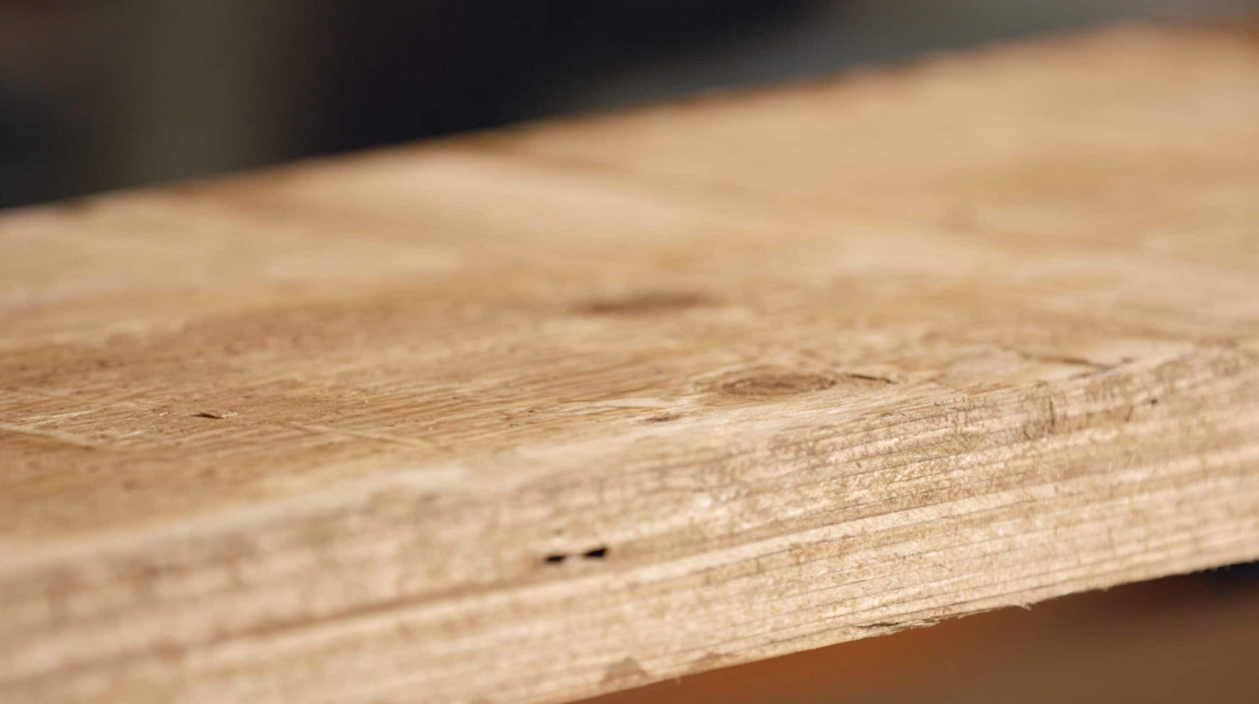 Close-up of Laminated Veneer Lumber (LVL) showing layered wood veneers