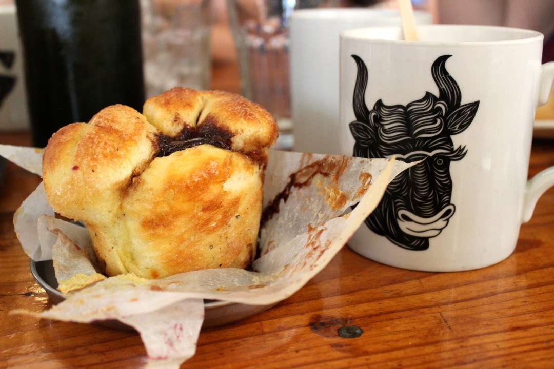 Chocolate brioche and coffee, a dessert-like brunch option, illustrating the sweet side of brunch.