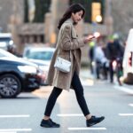 Pedestrian crossing a street, illustrating jaywalking concept