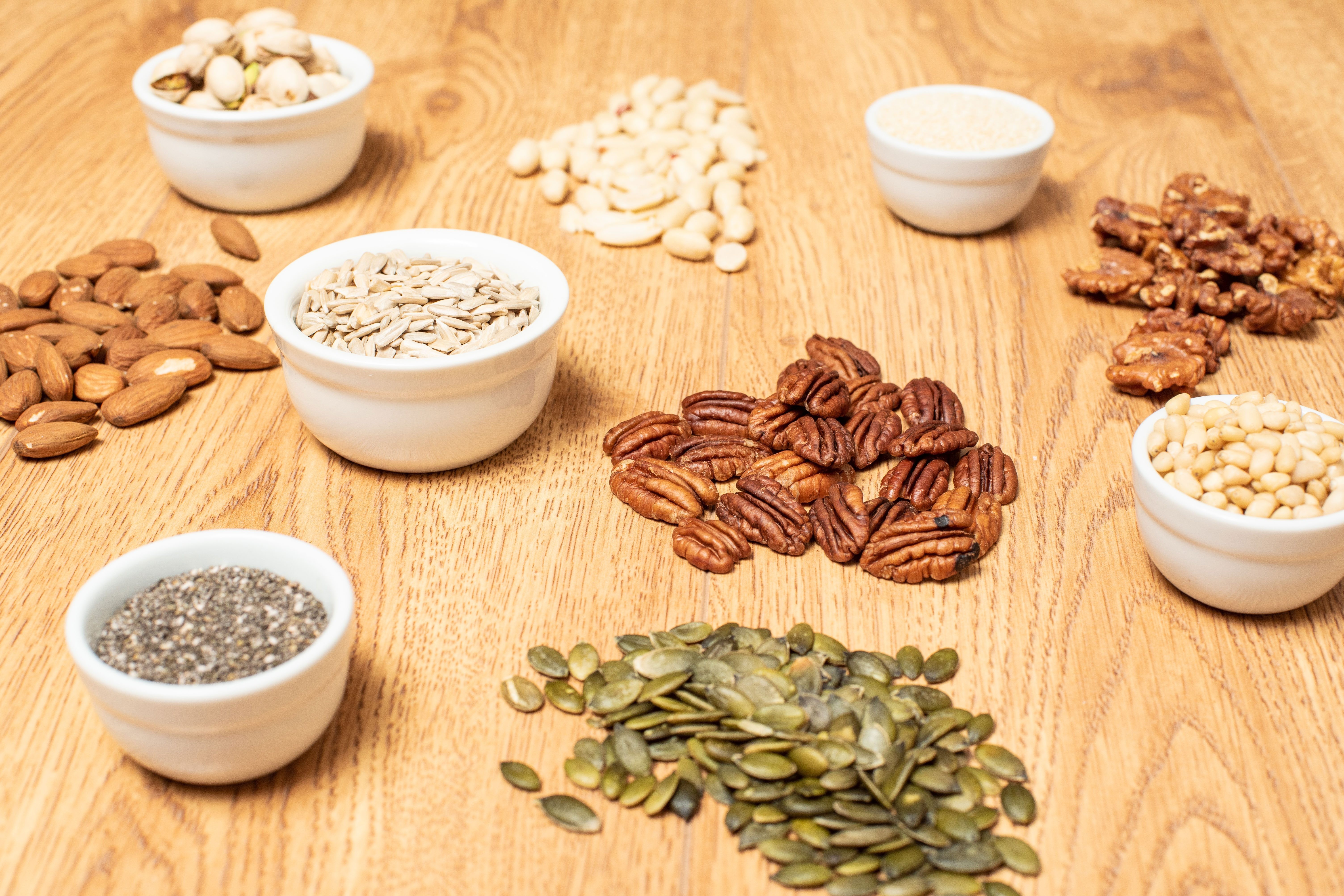 Piles of different nuts and seeds