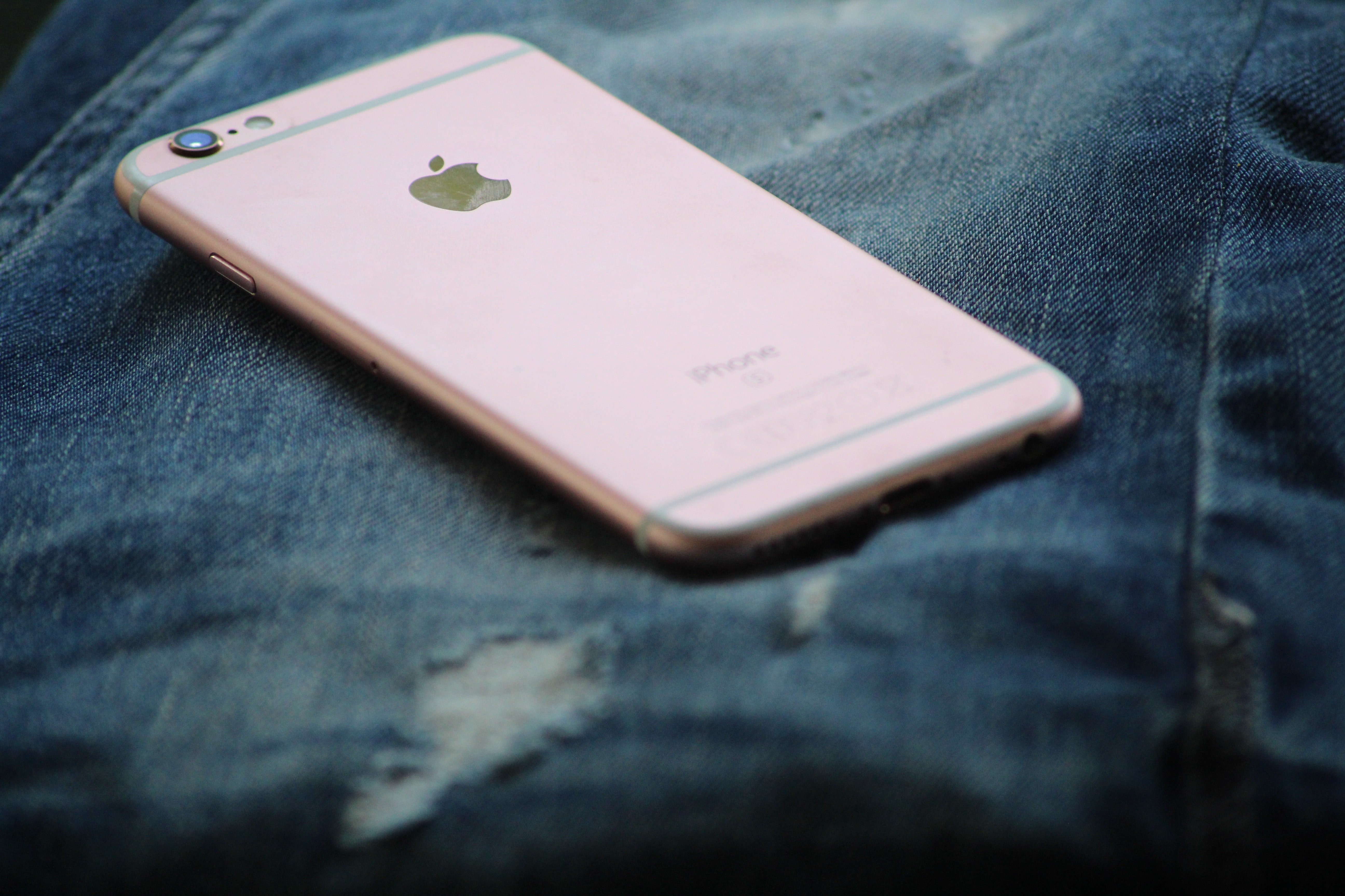 Close up shot of person using black smartphone