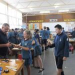 Students in a tech class at Blockhouse Bay Intermediate School in New Zealand, engaged in hands-on learning