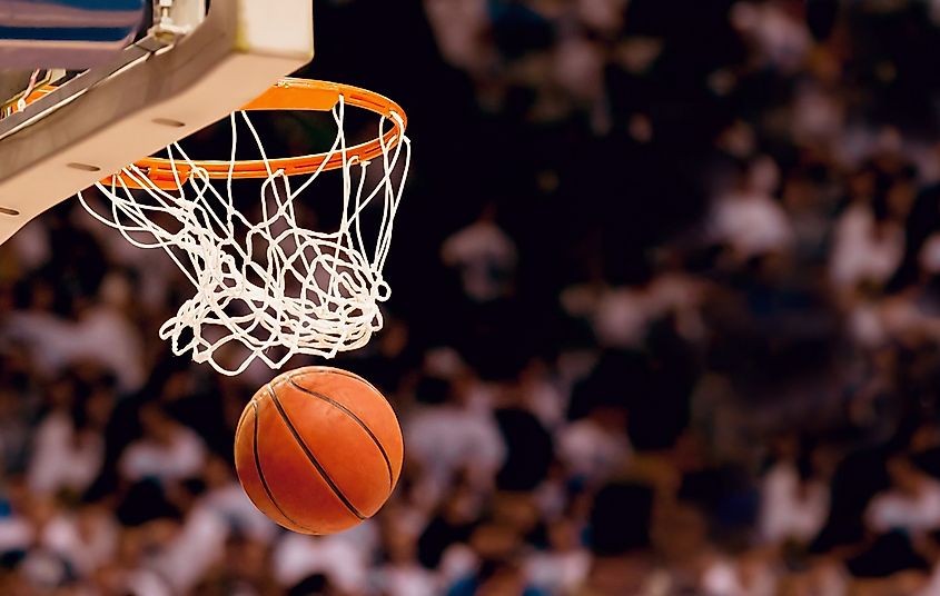 Players scoring during a basketball game