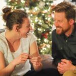 Father and daughter smiling together, representing the loving bond in a father-daughter promise ring relationship.