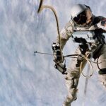 NASA astronaut Ed White during the first American spacewalk, a pivotal moment in the Gemini IV mission conducted in June, highlighting human capability in space during the Gemini month.