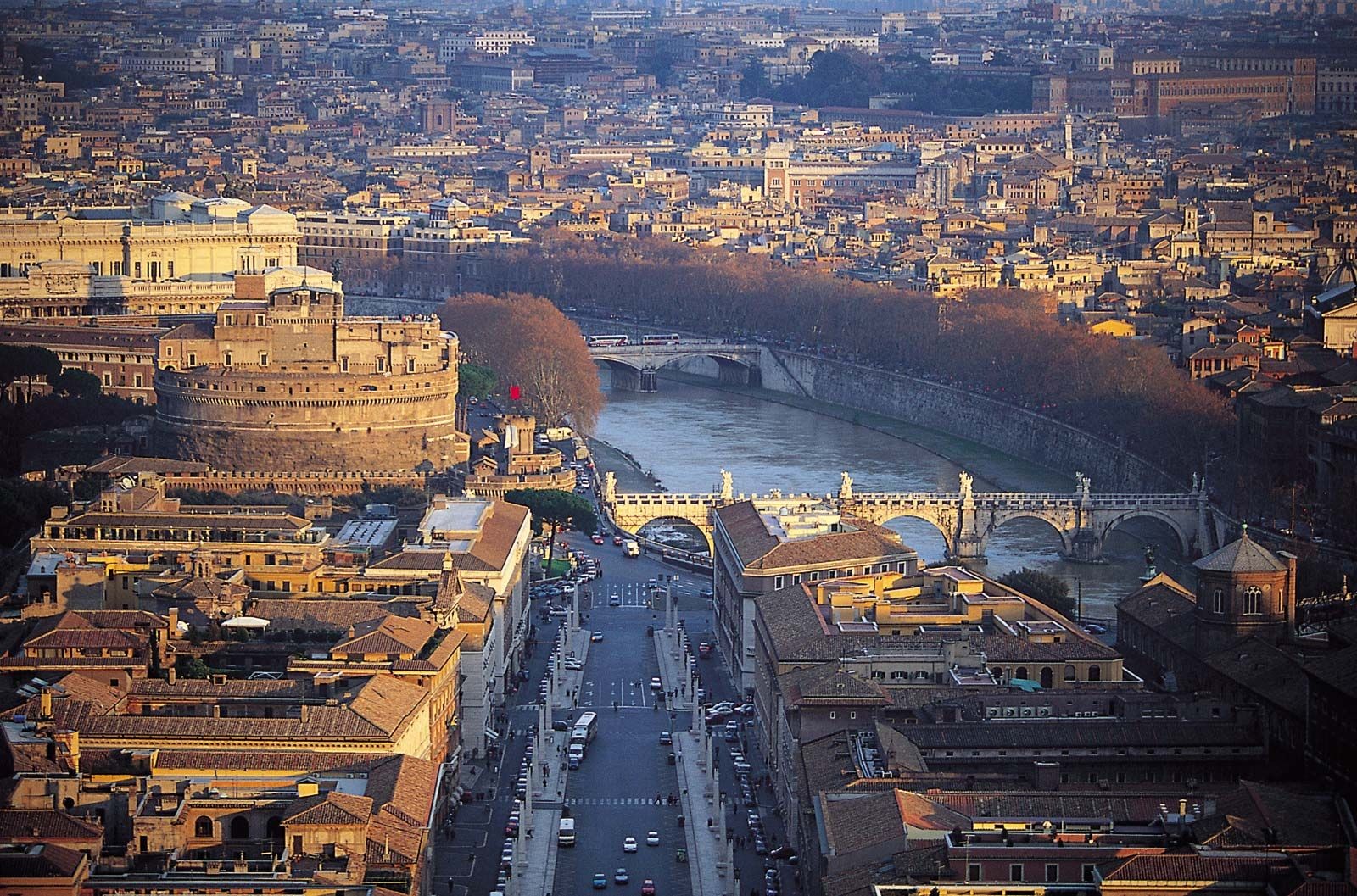 Aerial view of Rome, Italy, showcasing historical architecture and urban landscape.