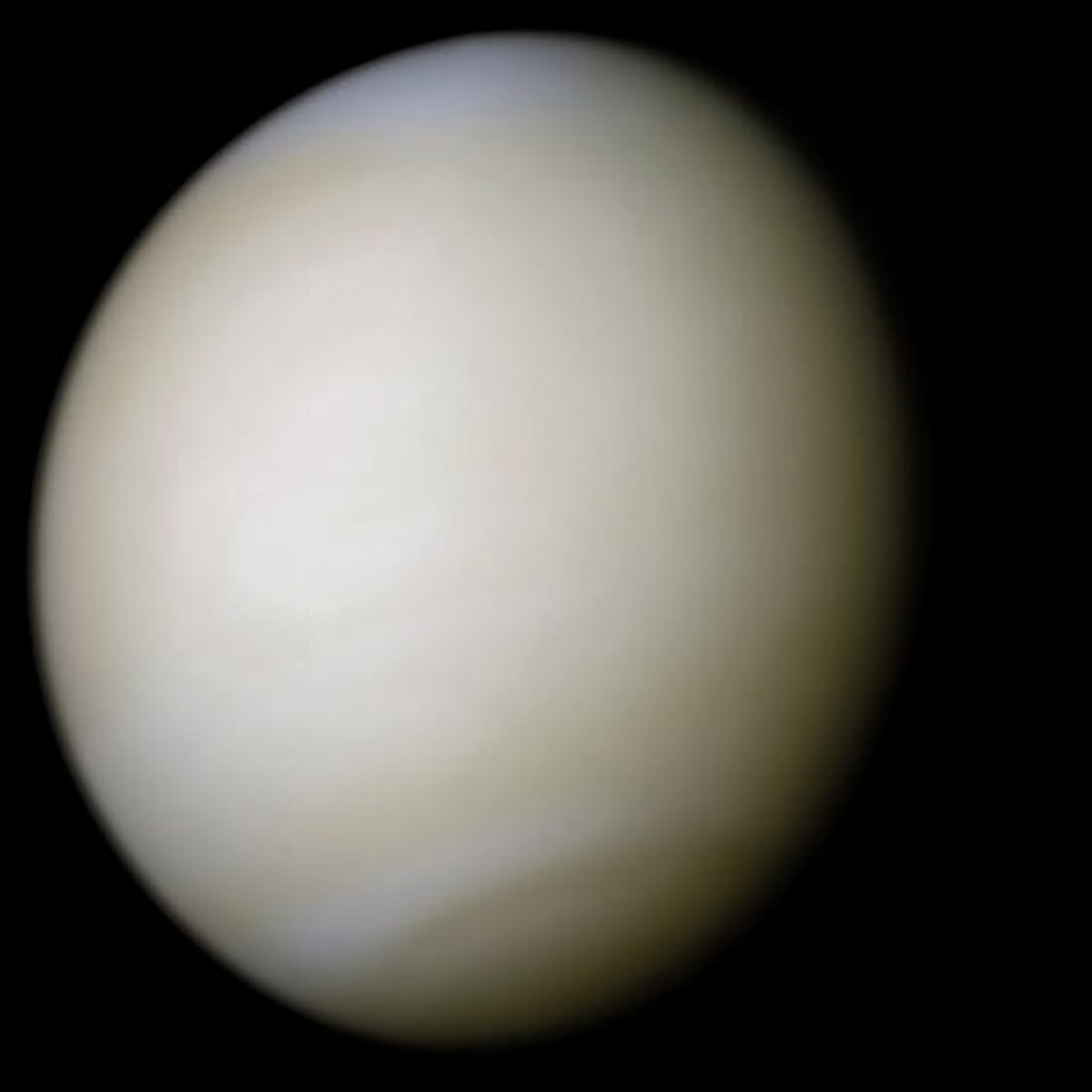 Venus as seen from space, revealing its dense, yellowish atmosphere