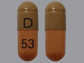 Pills on a Wooden Background