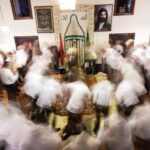 Sufi whirling dervishes performing Sama, a devotional practice.
