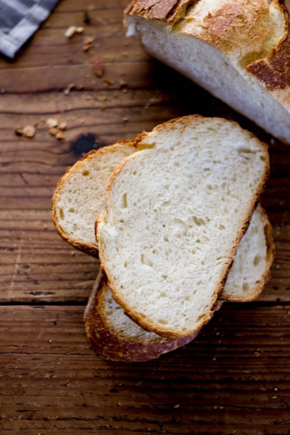Close-up of sourdough bread showing the texture and airy interior
