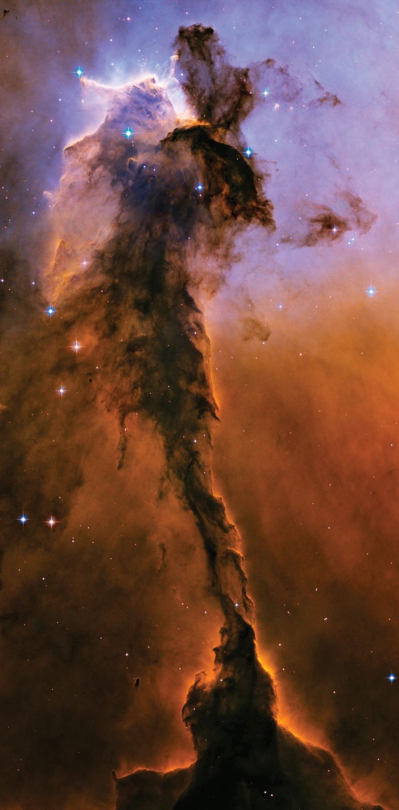 Eagle Nebula with cold dust and gas where stars are forming