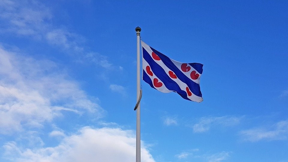 The flag of Friesland, symbolizing the region's unique culture and language, West Frisian