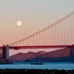Full moon over the Golden Gate Bridge in San Francisco, CA.