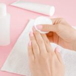 Acrylic nails with a glossy pink finish