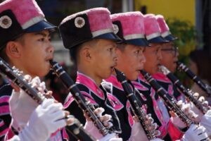 A clarinet section in a marching band