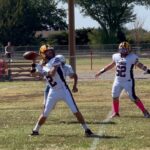 Jack Short looking intently at the field during a football game.