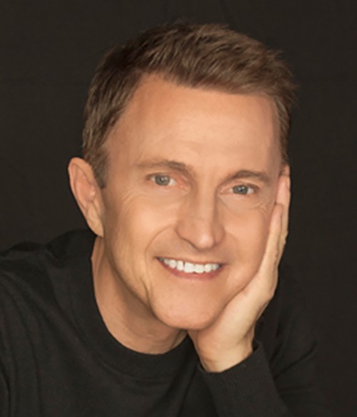 Jeff Harnar in a performance, showcasing engaging stage presence