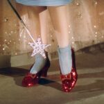 Judy Garland as Dorothy Gale wearing the Ruby Slippers in "The Wizard of Oz"