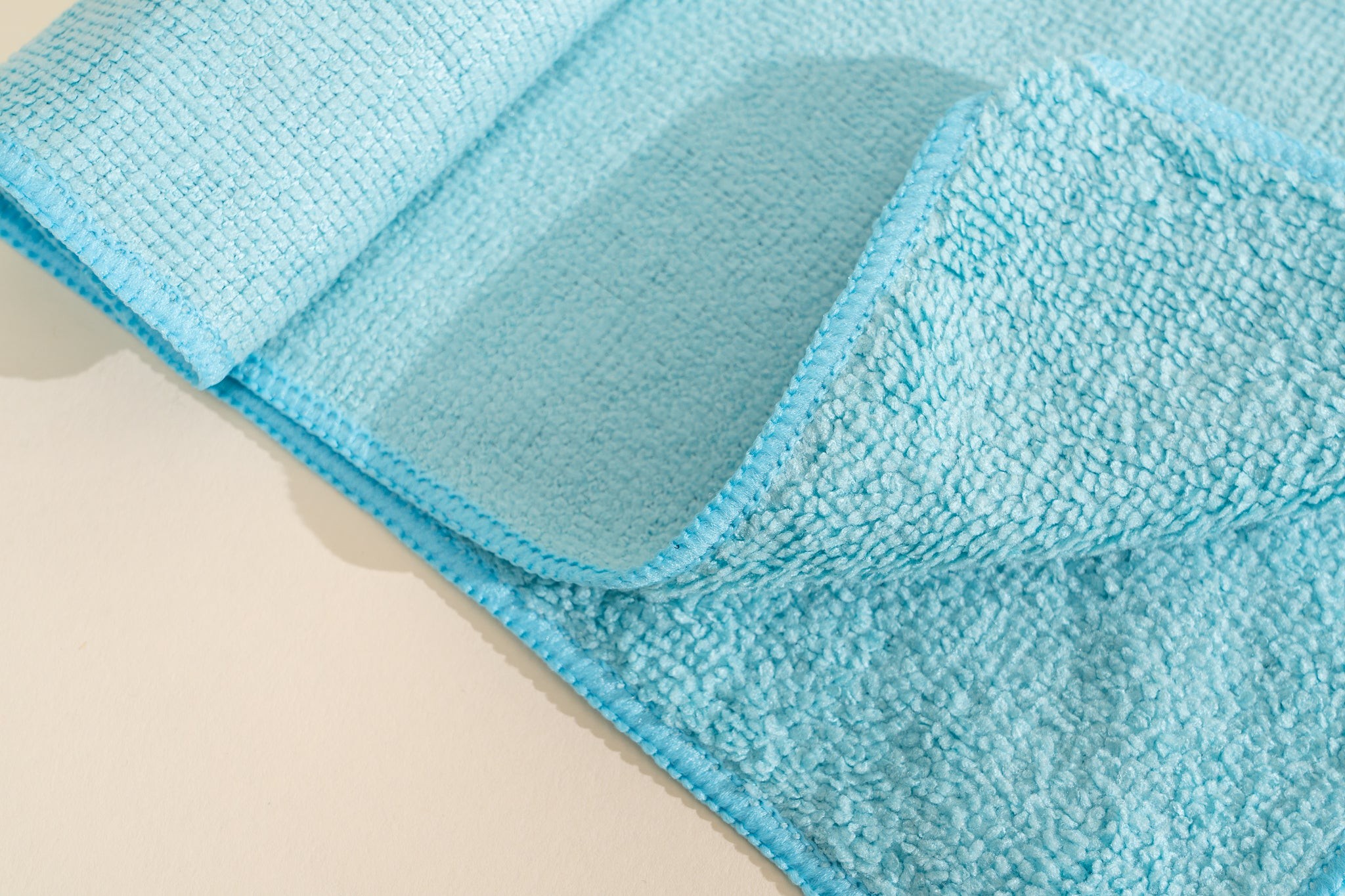 A close-up of a blue microfiber cloth.