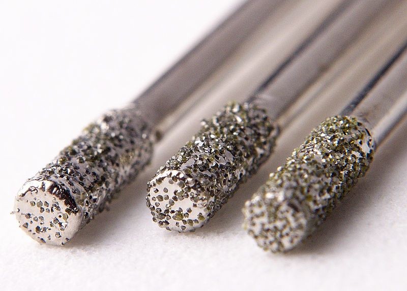 Diamond coated drill bits