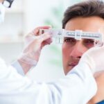 Measuring pupillary distance using a mirror, ensuring accurate alignment and repeated measurements for precision