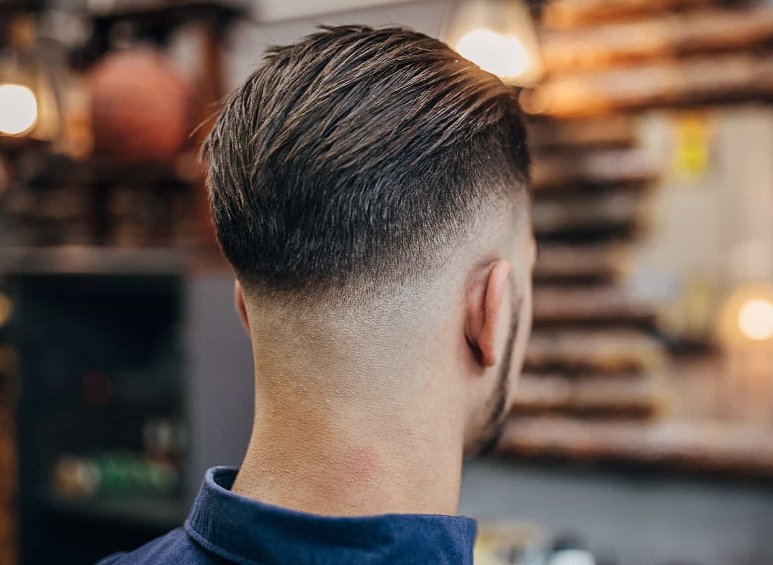 Detailed view of a skin fade haircut, illustrating the hair fading completely into the skin for a clean, sharp look