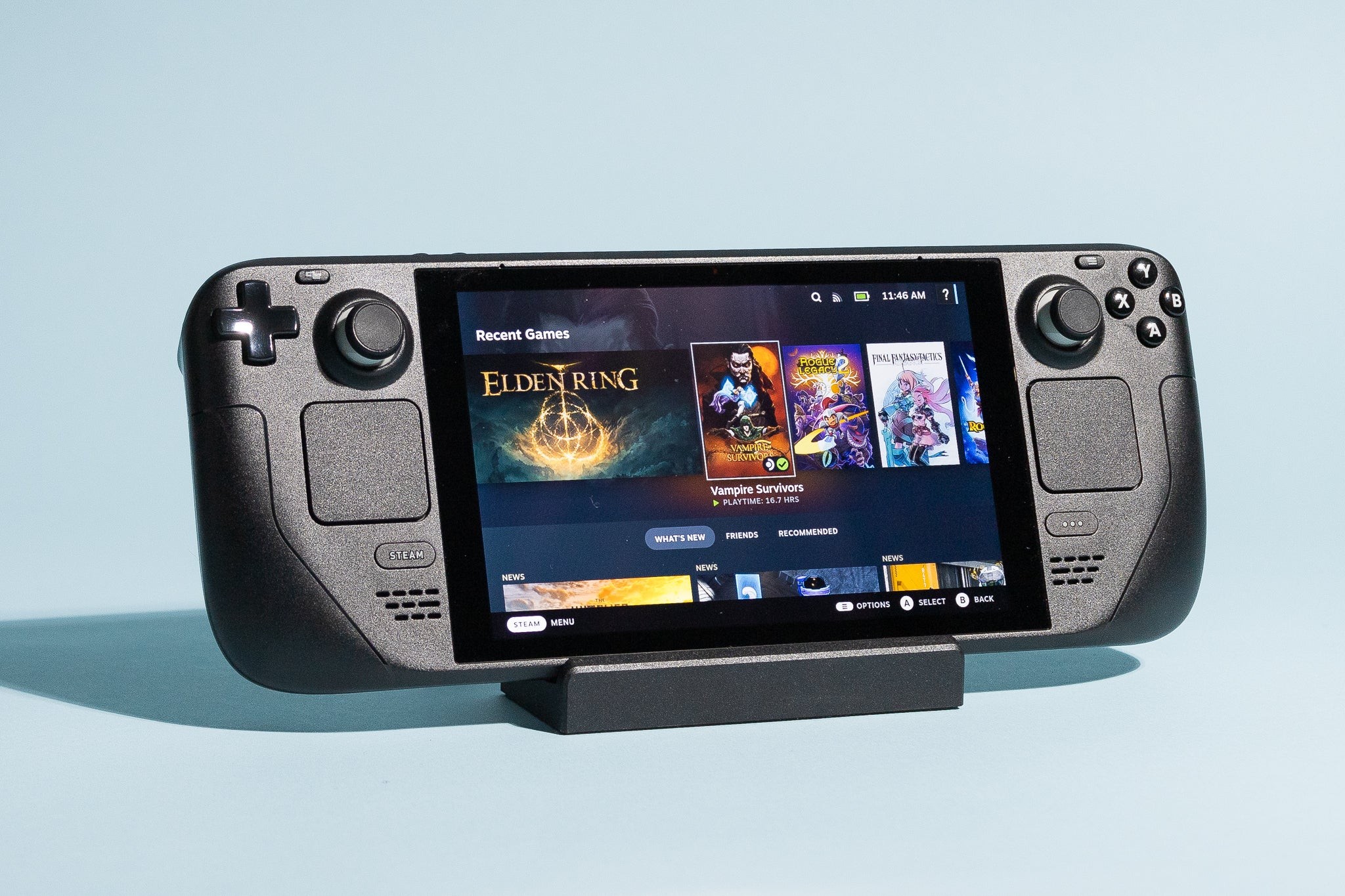 Steam Deck shown in front of a light blue background with its game library on its screen.
