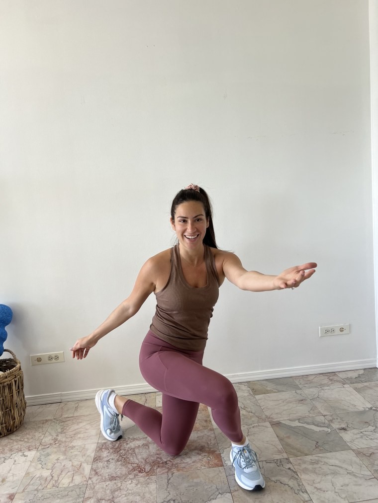 A woman doing skaters as part of a tabata workout