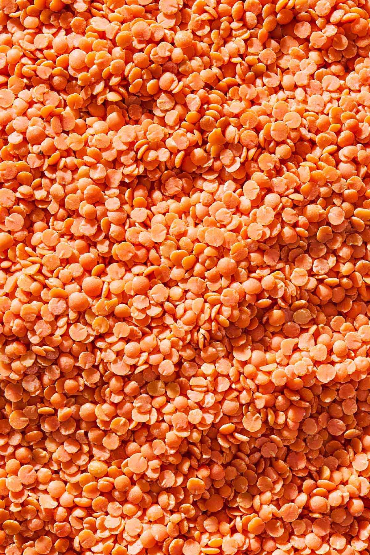 Close-up of cooked red lentils, highlighting their soft texture