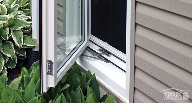 Replacement casement windows provide unobstructed views.