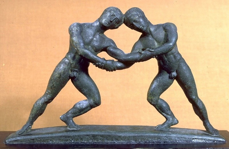 Praenestine Cista Handle depicting wrestlers